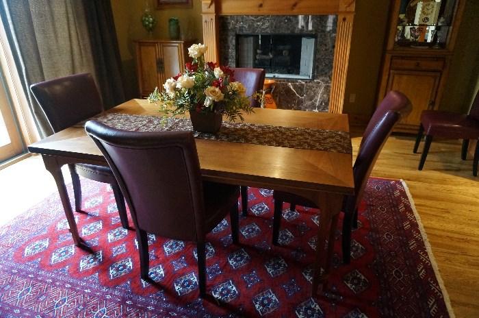 Teak dining table with 6 chairs and 3 leafs