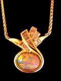 Gorgeous 8 Carat Australian Opan set with 26 Baguette Diamonds totaling 1.66 Carats total. Set in 18 K Gold.