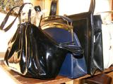 Lucite closure, patnet leather purse.