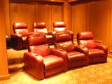 Custom Made leather Theatre loungers. We are selling them in sets of 3. They are completely motorized and go all the way back for sleeping.