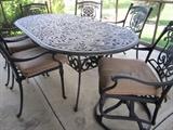 PATIO TABLE AND 6 CHAIRS