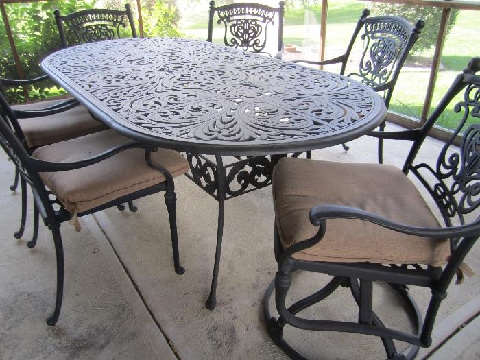 PATIO TABLE AND 6 CHAIRS