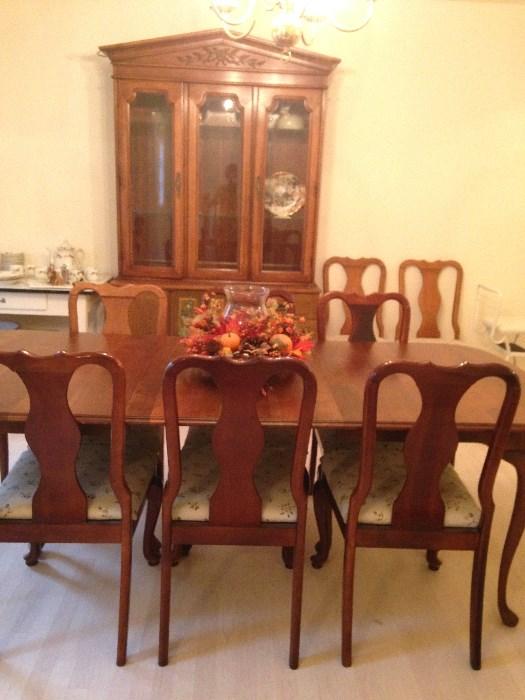 Cherry dining room set & china cabinet. Chairs are sold