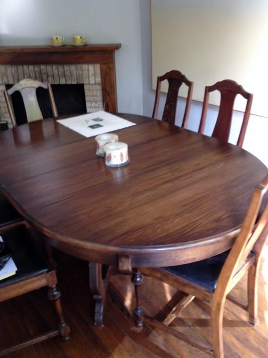 antique dining table and 6 chairs