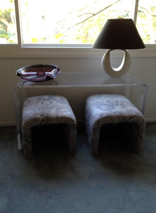 Lucite sofa table, 2 small ottomans, art glass bowl, art lamp