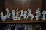 Many, many Precious Moments figurines