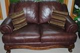 Ashley matching leather sofa and loveseat. Like new condition!
