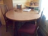 round kitchen table with 2 leaves,  6 dining chairs