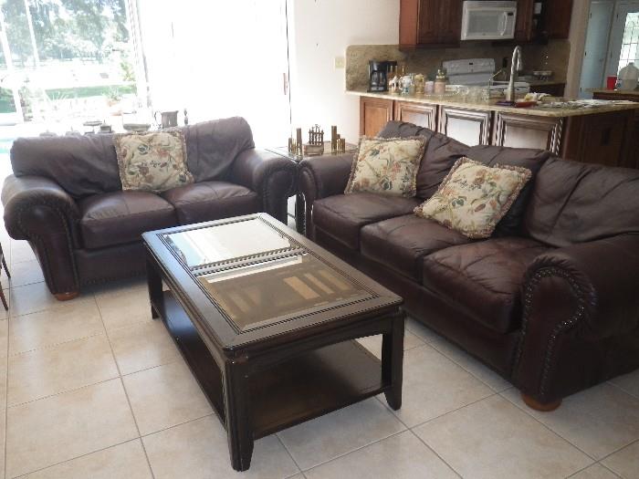 Leather couch, loveseat and coffee table with matching side tables