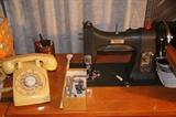 Vintage White Sewing Machine and Rotary Phone