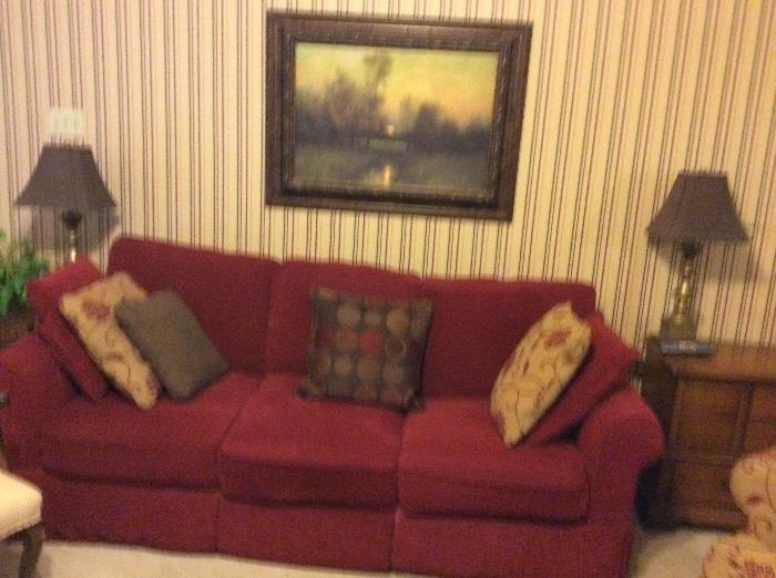 Cranberry sofa good shape, painting over sofa
