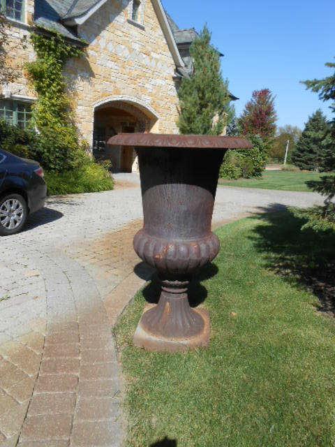 Oversized iron urn Approx 5' tall by 3' wide at the top. Two available