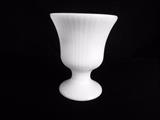 Milk Glass by E.O. Brody Company
