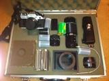 Canon camera kit in metal case.