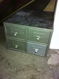 Metal file cabinets and smaller filing drawers.