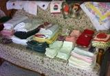Table and kitchen linens. (Sofa not for sale.)