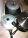 Lots of pots and pans, pressure cooker, soup pots, Corning Ware, Pyrex and more.