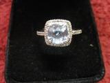 Blue Topaz and 10kt white gold ring and matching earrings.  Never used. 