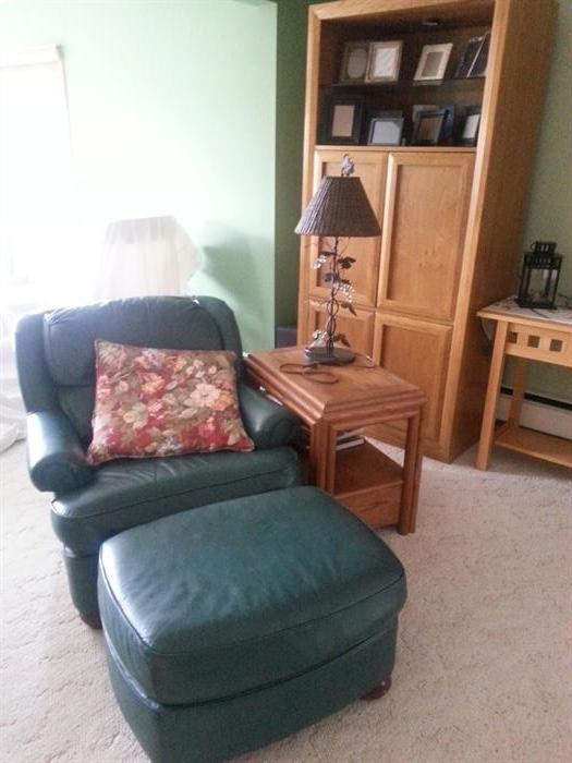 DARK GREEN LEATHER CHAIR AND OTTOMAN - $150