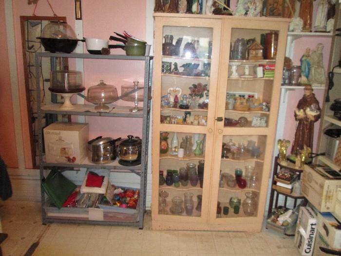 More appliances, knick knacks and a vintage cabinet.