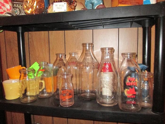 Added for Friday - a collection of early milk bottles.  Most from defunct Michigan dairys