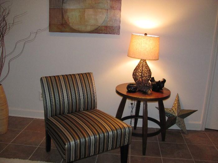 Striped armless accent chair, round occ. table, woven lamp, wall star, accents