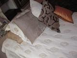 Accent pillows, linens, bed cover