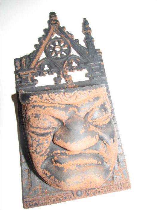 Unique cast iron match holder/wall pocket