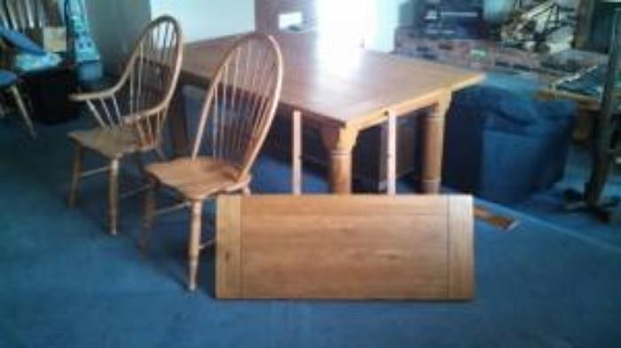 6' Country Table with two 3' leaves and eight chairs (2 with arms). Excellent Condition.
