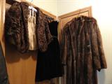 Woman's vintage fur cape, coat, and dress
