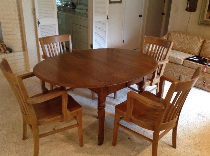 oak drop leaf table and four armchairs