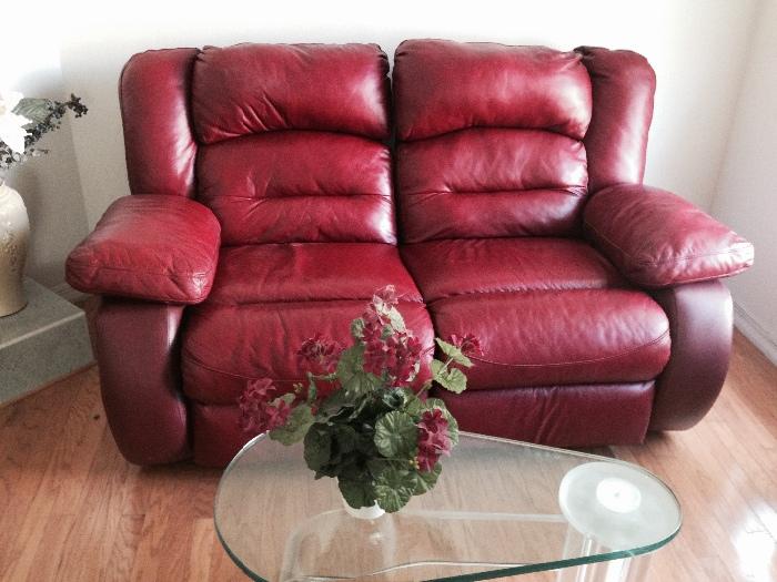 Red leather loveseat with 2 recliners