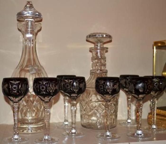 Waterford signed decanter on left, cut sherry stems, cut crystal decanter