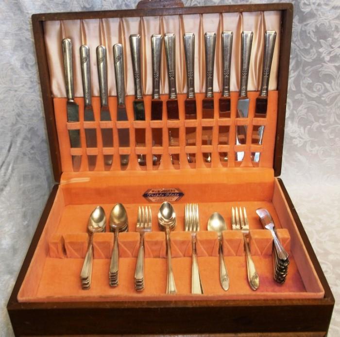 Large set of plated flatware