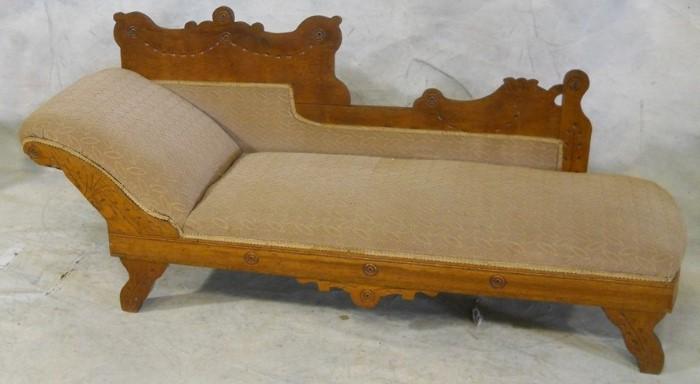 Victorian Walnut spoon carved fainting sofa 