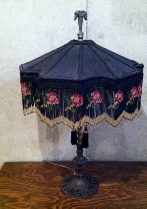 antique lamp with handmade beaded shade
