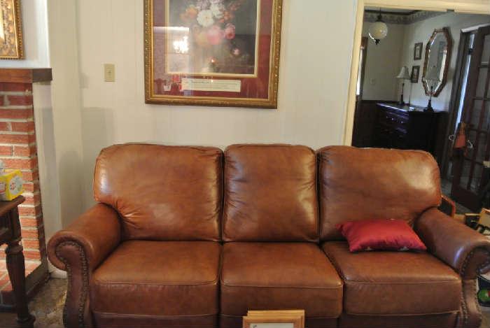 Reclining Leather Sofa and Matching Love Seat 