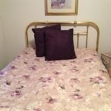 Brass bed frame and comforter set