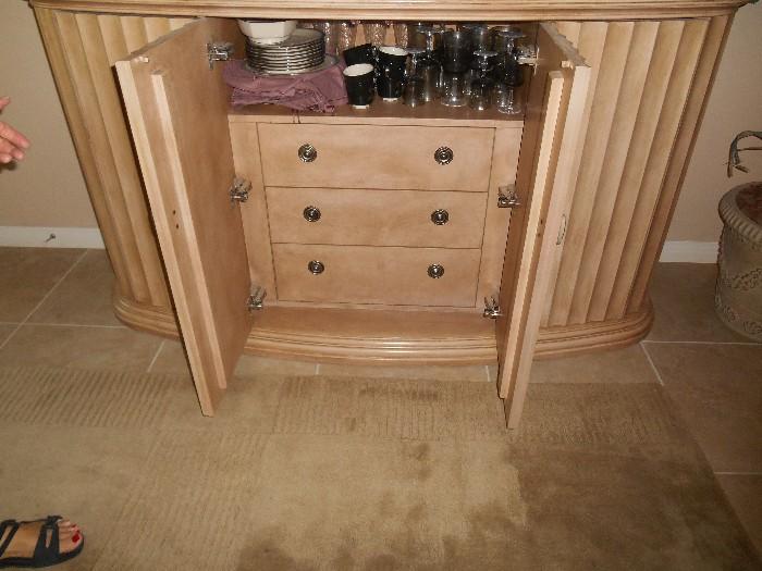 Check this out - it'a bar or storage cabinet for linens