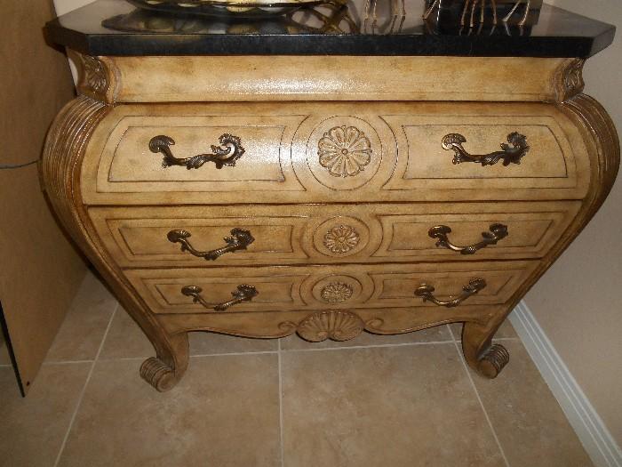 Sideboard with marble top and scripted detail