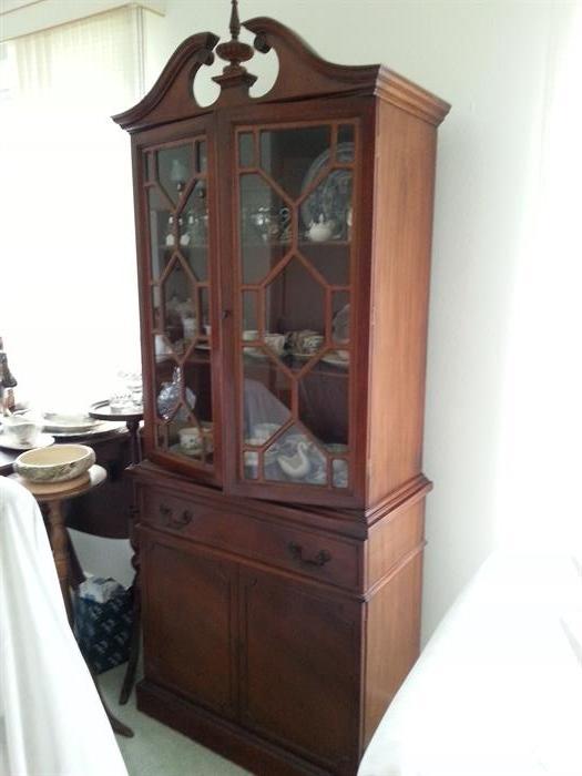 China cabinet to matching set of dining room table and 6 harp back chairs with needlepoint cushions and hutch.