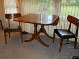 Drop leaf dining table, has 4 chairs and leaf