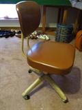 vintage 1950's revolving office chair, very mid century modern industrial age