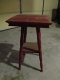 circa 1900 parlor table that has been painted red