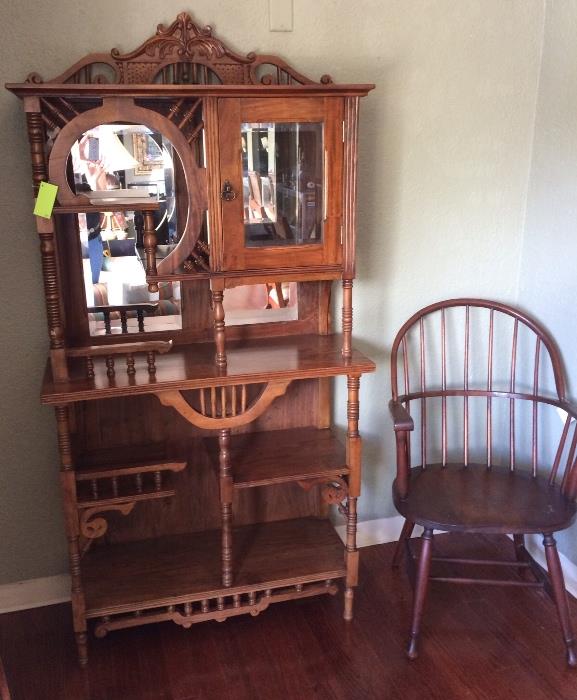 Victorian reproduction curio and antique chair.