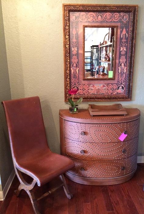 Tommy Bahama leather and nailhead trim console, leather chair, painted mirror.