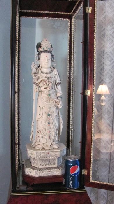 Large Carved Chinese Figure in Elaborate cased cabinet. 