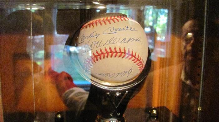 Signed Baseball- Mickey Mantle, Ted Williams. Housed in a Glass case. 