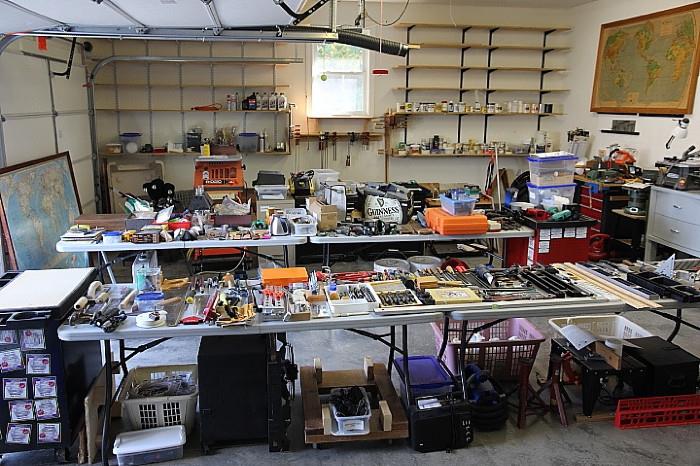 Garage is packed full of tools, woodworking equipment