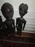 CLOSE UP VIEW OF AFRICAN MUSEUM QUALITY CARVINGS PURCHASED FROM SOETHBYS IN 1960S